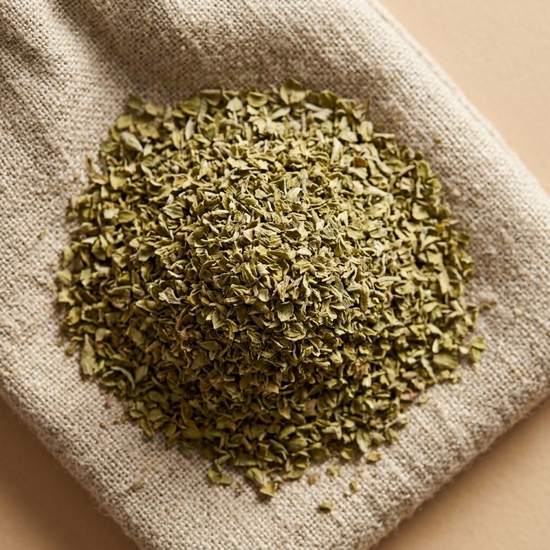 Dried oregano leaf on a linen sack